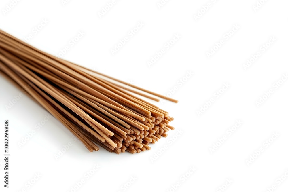 a small amount of dry buckwheat noodles on a white background copyspace a small amount of dry buckwheat noodles on a white background copyspace