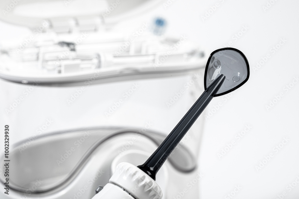 irrigator for oral care on a light background- Image irrigator for oral care on a light background- Image