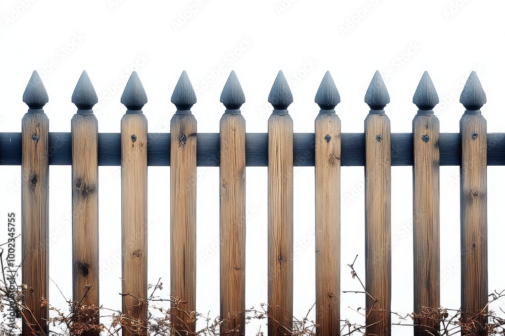 Wooden Fence With Pointed Tops in a Misty Landscape During Winter Wooden Fence With Pointed Tops in a Misty Landscape During Winter
