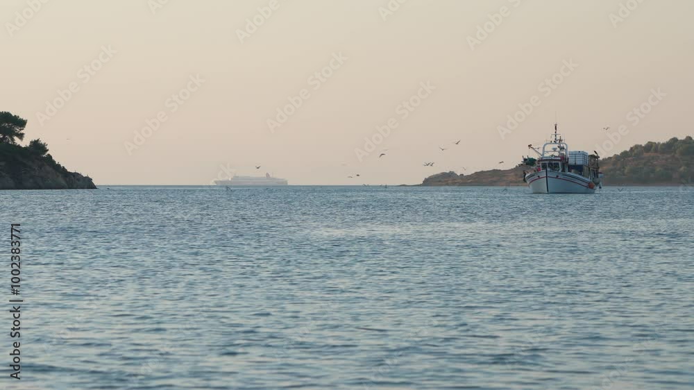 fishing boat returning from a night fishing in the morning. June 5, 2024 at the port in the fishing village of Pirgi Lesbos, Greece fishing boat returning from a night fishing in the morning. June 5, 2024 at the port in the fishing village of Pirgi Lesbos, Greece