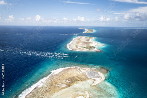 Фотография Paradise found - Aerial view of an atoll pass in French Polynesia