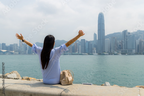 Photography Tourist woman enjoy the view in Hong Kong city