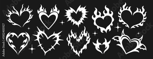 Neo tribal aesthetic y2k tattoo with heart shape. White gothic romance stickers or cyber ornament set. Neotribal emo love logo. Trendy hand drawn goth stylized burning hearts silhouette on fire flames