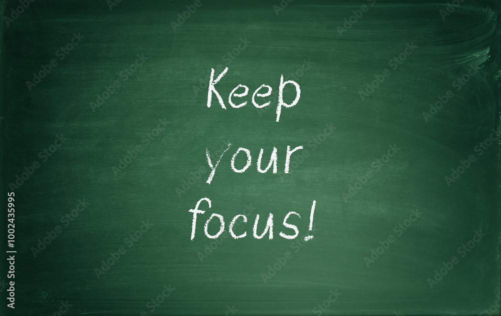 Green chalkboard with text Keep your focus, mindset concept Green chalkboard with text Keep your focus, mindset concept