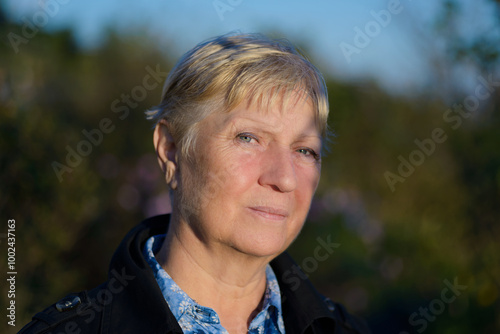 Portrait of a beautiful middle-aged woman on a walk.