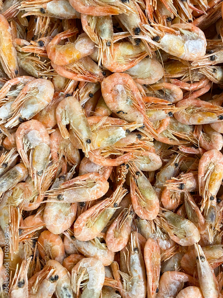 Lots of frozen unpeeled shrimp top view Lots of frozen unpeeled shrimp top view