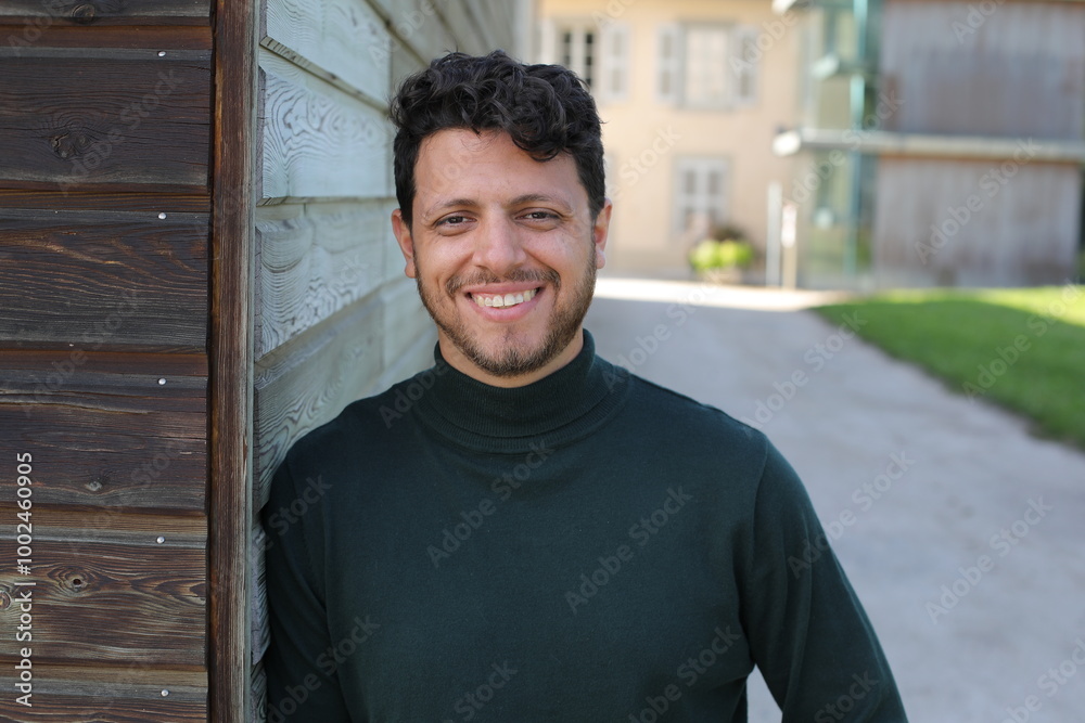 Obraz premium Handsome bearded man wearing an elegant turtle neck sweater 
