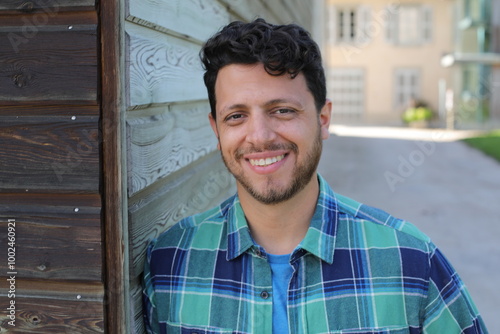 Natural man wearing a plaid shirt 