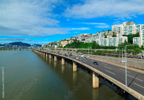 Hannam-dong, Yongsan-gu, Seoul, South Korea - July 27, 2020: Gangbyeon Expressway on Han River with the background of Hannam Bridge and highrise apartments