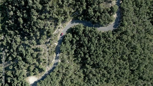 Drone footage of cars on a country road near Le Perthus, France photo