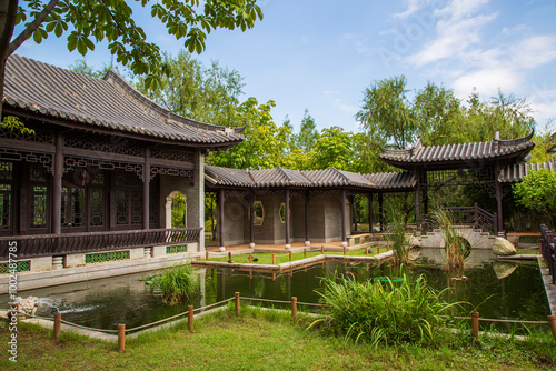 Hyowon Park, Suwon-si, Gyeonggi-do, South Korea - September 1, 2020: Traditional Chinese architecture, Wolhwawon Pavilion is on the pond photo