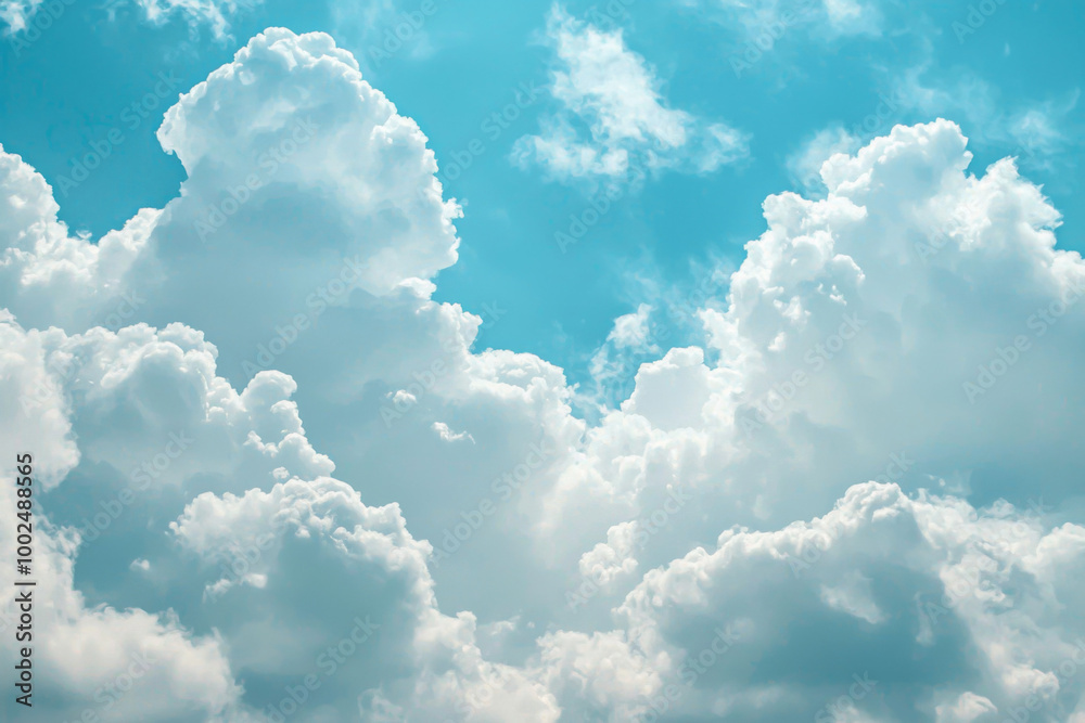 Fluffy white clouds floating in a bright blue sky on a sunny day Fluffy white clouds floating in a bright blue sky on a sunny day