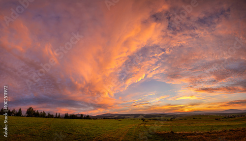 Obraz na płótnie Beautiful,dramatic sky illuminated by the sun during sunset-Panorama w salonie