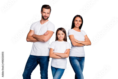 Portrait of focused family with brunette hair crossing their hands looking wearing white t-shirt denim jeans isolated over blue background