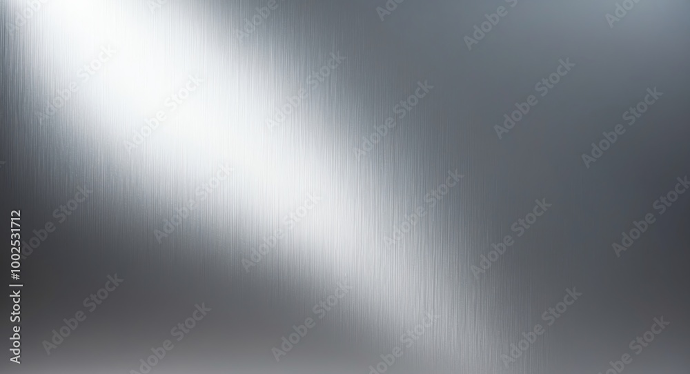 Bright aluminum gradient metal surface with a cool finish providing a sleek backdrop