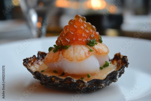 a small dish with shrimp and caviar on top photo