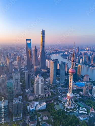 Fototapeta Naklejka Na Ścianę i Meble -  Aerial view of modern city skyline and buildings at sunrise in Shanghai