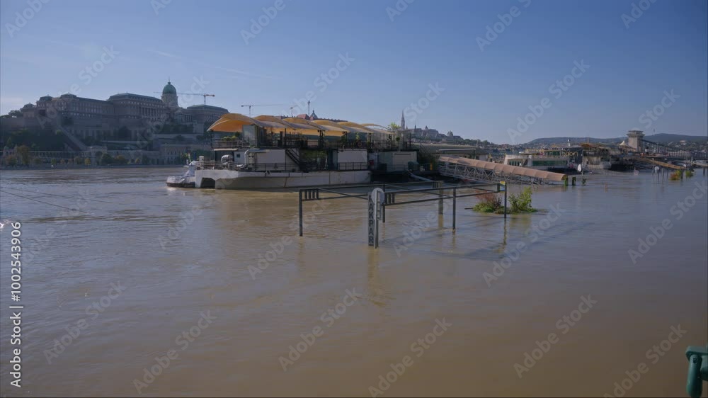 Ports along the Danube River are submerged after a huge flood. View of Rakpart and Buda Castle during the flood in Budapest. Huge tidal flow on the Danube. Danube Flood Threatens Budapest. Flood Alert Ports along the Danube River are submerged after a huge flood. View of Rakpart and Buda Castle during the flood in Budapest. Huge tidal flow on the Danube. Danube Flood Threatens Budapest. Flood Alert