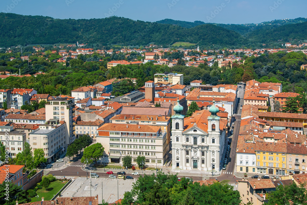 Aerial view of old town of Gorizia, Italy at sunny summer day. Victory Square (Piazza della Vittoria) and St Ignatius church (Chiesa di Sant'Ignazio). Aerial view of old town of Gorizia, Italy at sunny summer day. Victory Square (Piazza della Vittoria) and St Ignatius church (Chiesa di Sant'Ignazio).