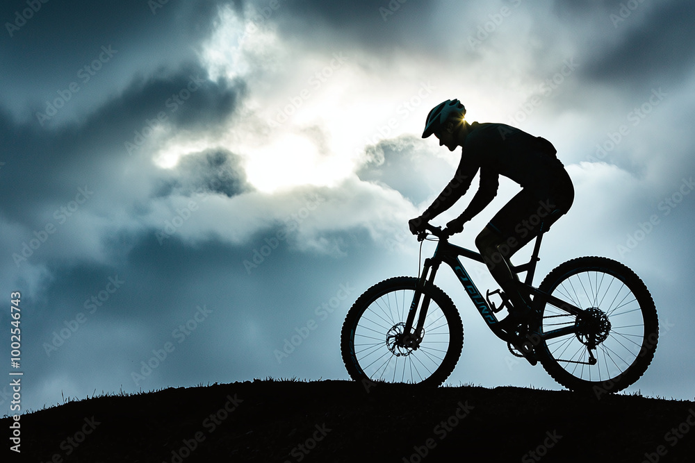 silhouette of cyclist against dramatic cloudy sky, sun peeking through silhouette of cyclist against dramatic cloudy sky, sun peeking through