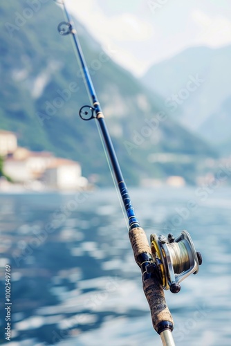 Fishing Rod Cast on Calm Water with Mountain View, Angling for a Trophy Fish in Paradise.