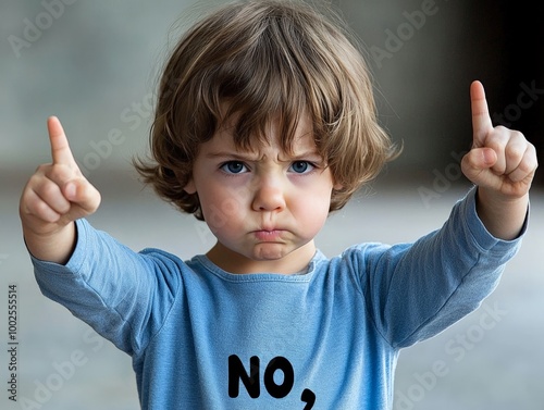 A child crossing their arms and pouting angrily after being told 