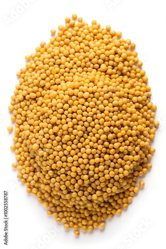 Yellow mustard seeds macro isolated on white, top view