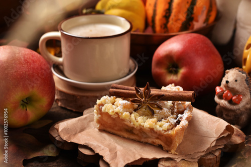 Homemade apple pie and latte coffee on rustic style table with autumn decors
