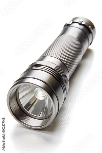 Close-up of a flashlight, isolated on white background