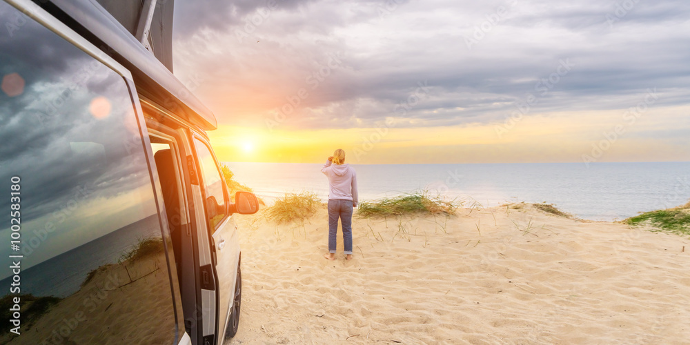 Transporter Camping Van bus at the California Ocean in the coastal Nature