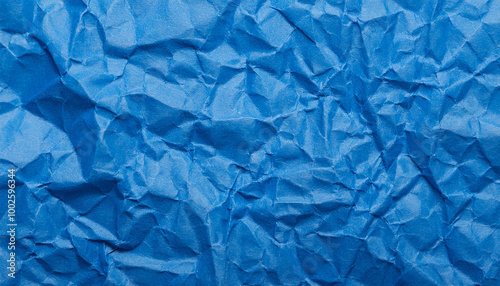 Crumpled blue paper background. Creative abstract texture for your design.