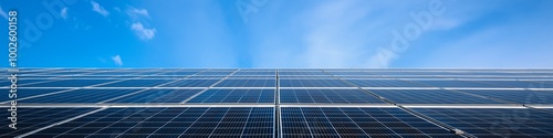 A solar panel is shown in the sky with a blue background. The solar panel is the main focus of the image, and it is surrounded by a clear blue sky. Concept of clean energy and sustainability