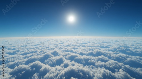 Above the clouds, with a rich blue sky photo