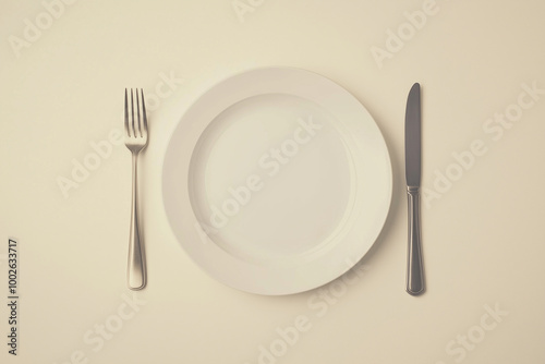 Table set for fasting: empty plate, utensils yom kippur