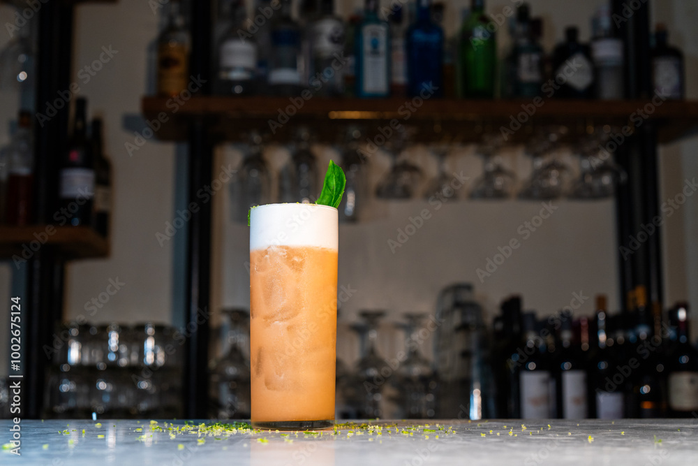 Landscape Wide Shot Orange & Mint Cocktail with Foam at High-End Bar Landscape Wide Shot Orange & Mint Cocktail with Foam at High-End Bar