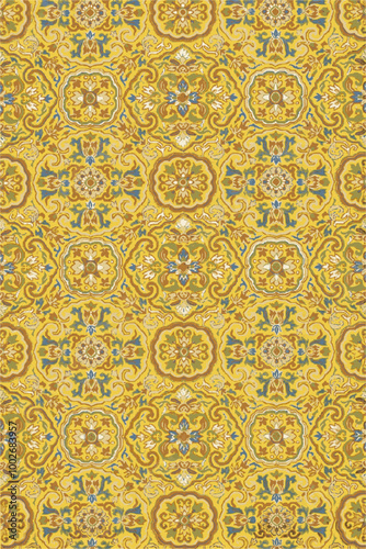  intricate floral pattern on yellow fabric.