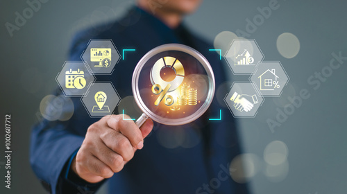 Mutual fund investment concept. Businessman use magnifying glass search fund icon on virtual screen. Equity capital value risk management. Pension return plan in stock market, private money financial
