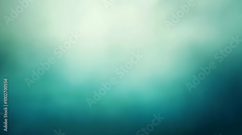 Blurred gradient emerald green to teal abstract background