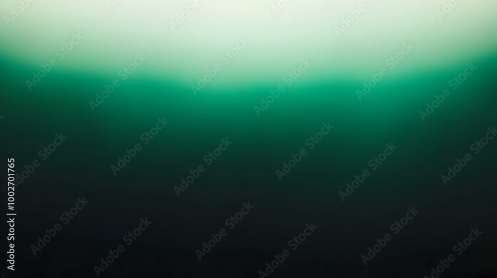 Obraz premium Blurred gradient emerald to black abstract background