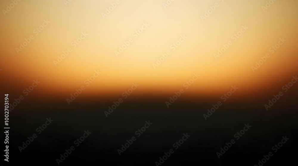 Obraz premium Blurred gradient black to ochre abstract background