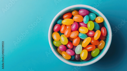 colorful jelly beans in a bowl, top view