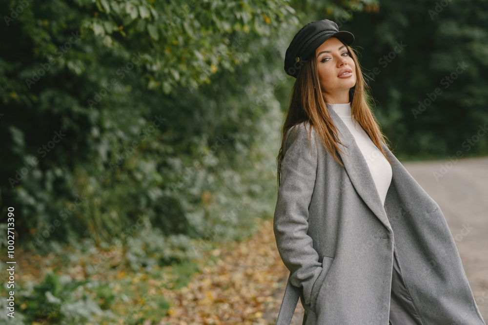 Elegant woman in a autumn park Elegant woman in a autumn park