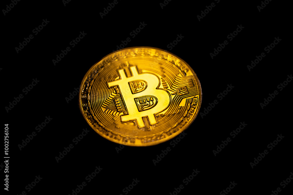 Bitcoin coin close-up on a black background. Background with cryptocurrency. Bitcoin coin close-up on a black background. Background with cryptocurrency.