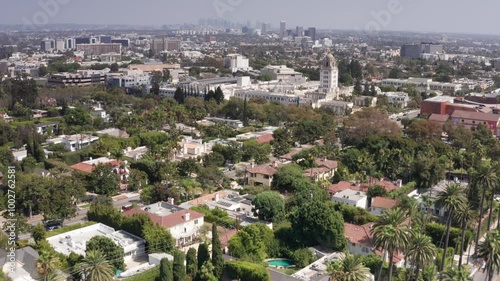 Low tilting up aerial shot of the sprawling city of Los Angeles as seen from Beverly Hills in Southern California. 4K