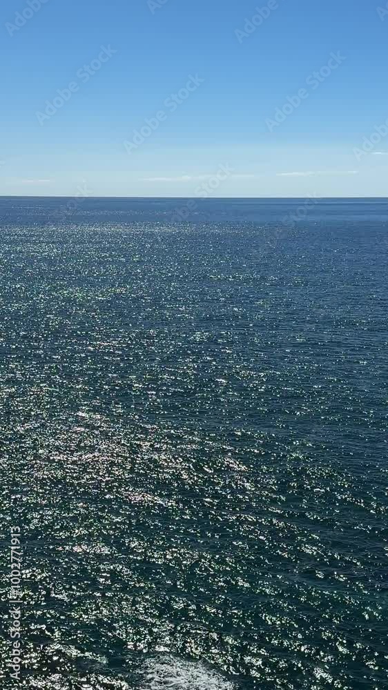 Blue ocean water shiny ripples surface and sky. Blue ocean water shiny ripples surface and sky.