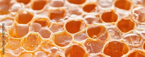 Close-up of honeycomb pattern with golden hues.