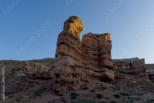 Large piece of canyon rock against blue sky