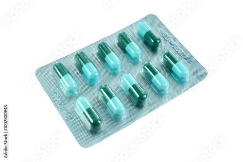 One strip of capsules isolated on transparent background.