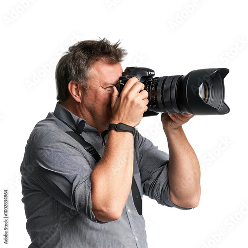 Photographer capturing an image with a DSLR camera photo