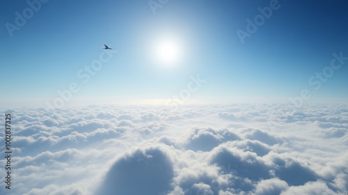 Above the clouds, with a vivid blue sky